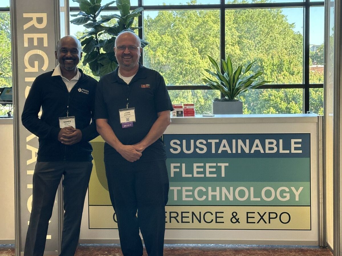Ganes Kesari with a fellow speaker at the Sustainable Fleet Technology Conference registration desk